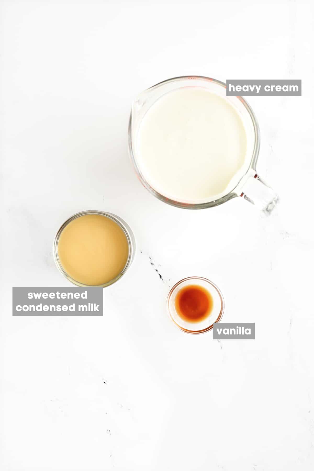 Heavy cream, sweetened condensed milk, and vanilla extract.