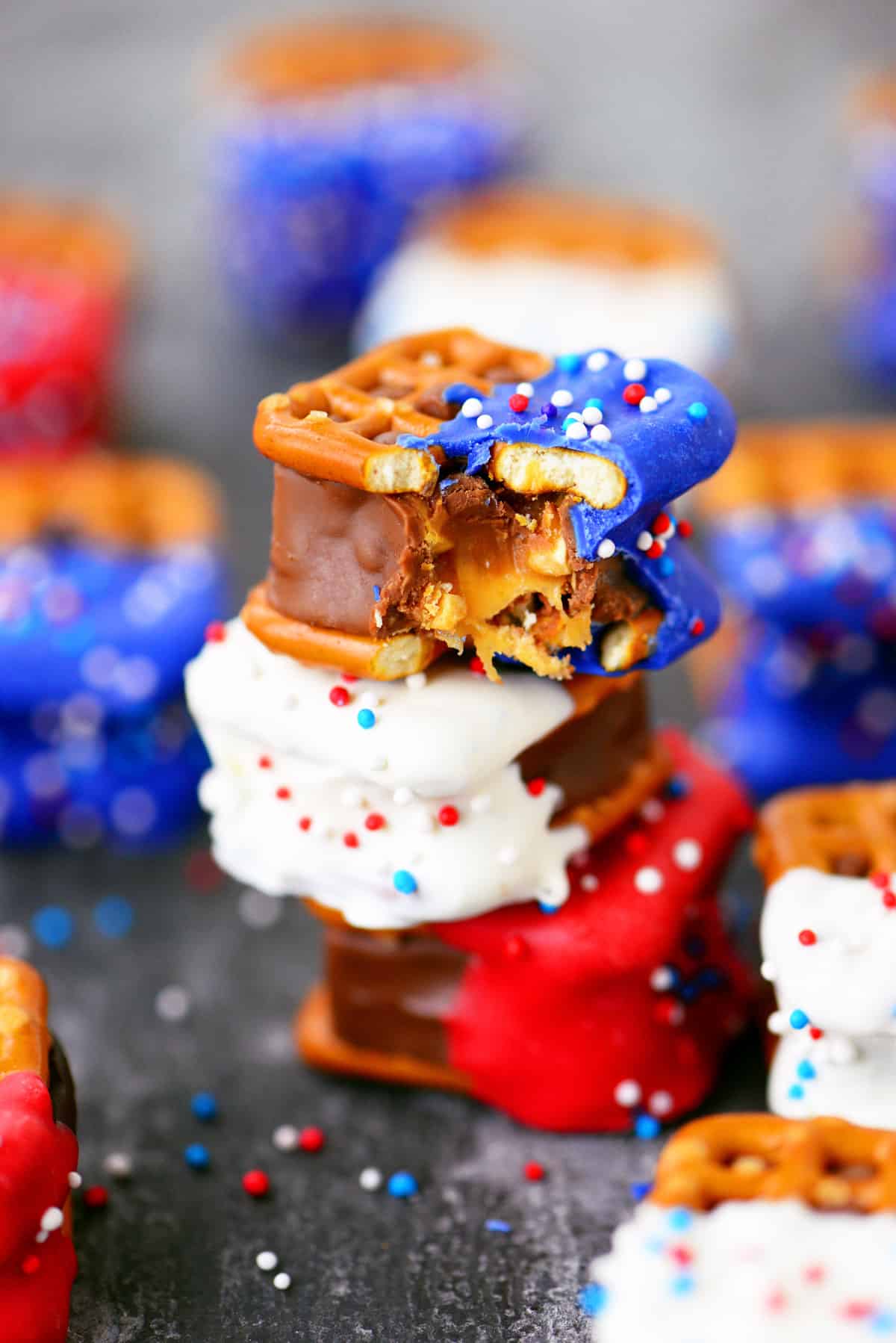 A stack of patriotic candy bar pretzel bites.