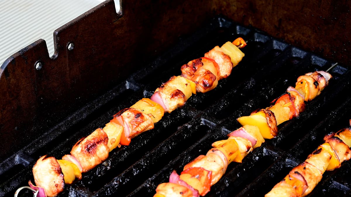 Pineapple chicken kabobs on the grill.
