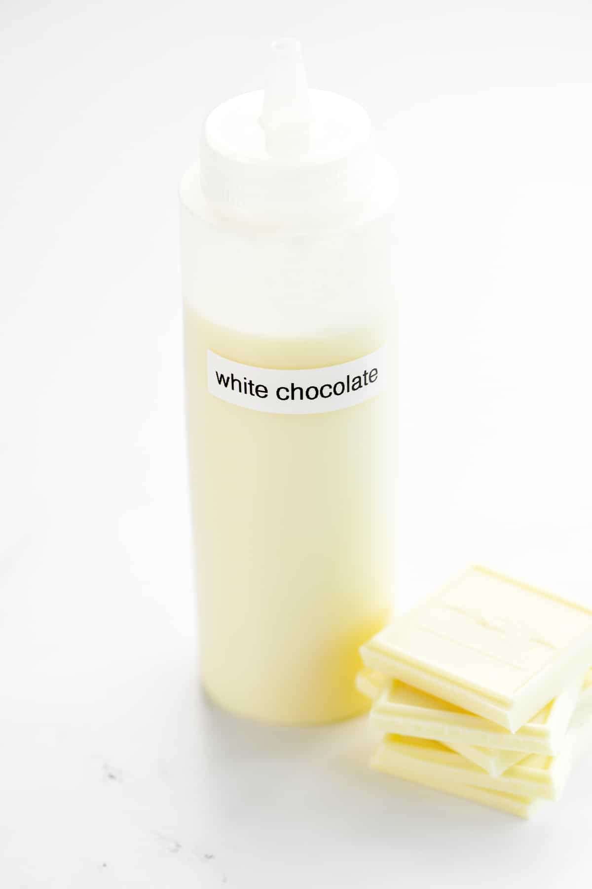 White chocolate sauce in a bottle.
