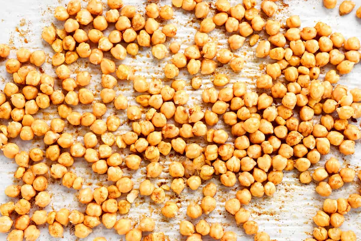 Chickpeas with olive oil and seasoning on top.