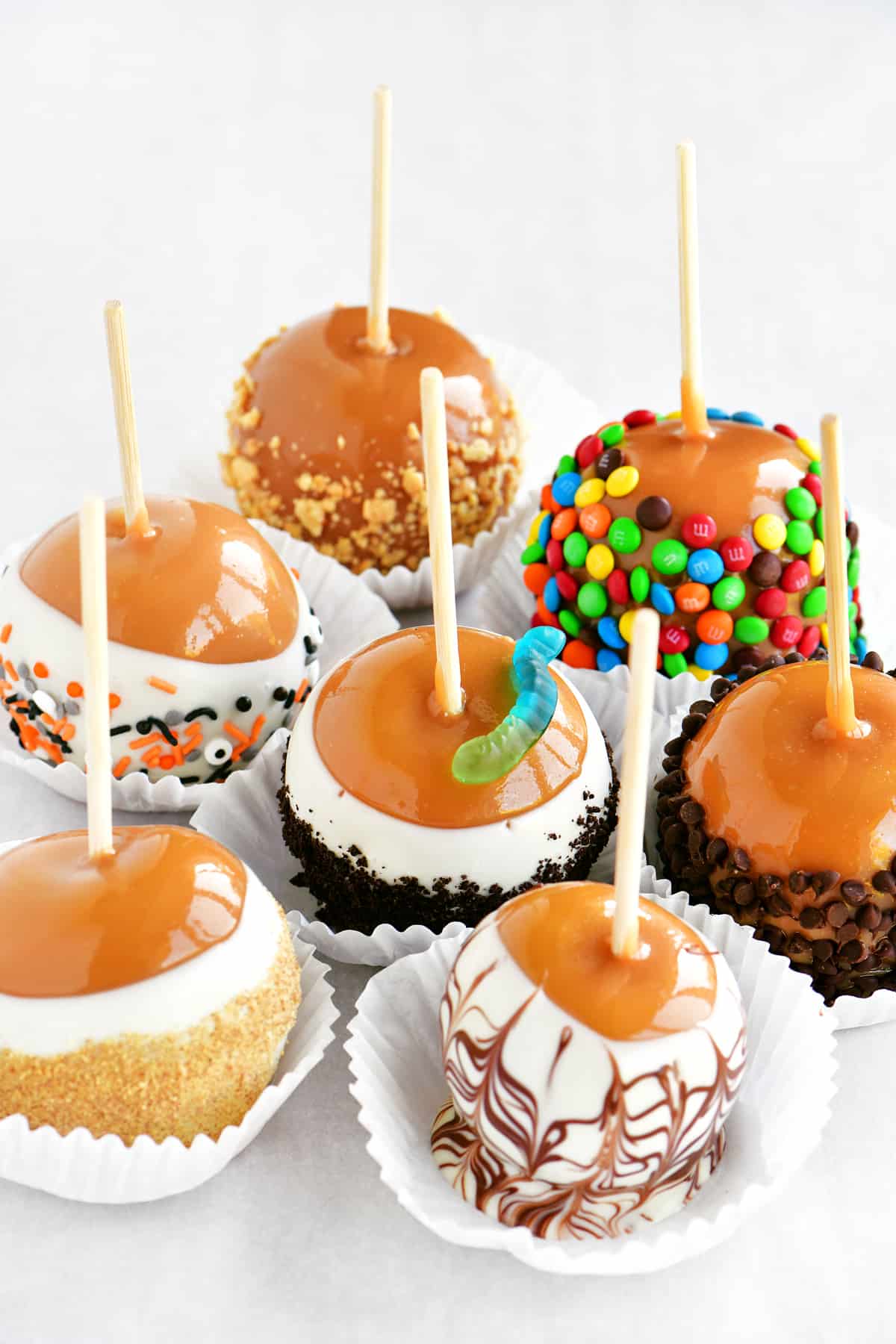 Caramel apples with toppings.