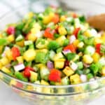 Mango cucumber salad in a bowl.