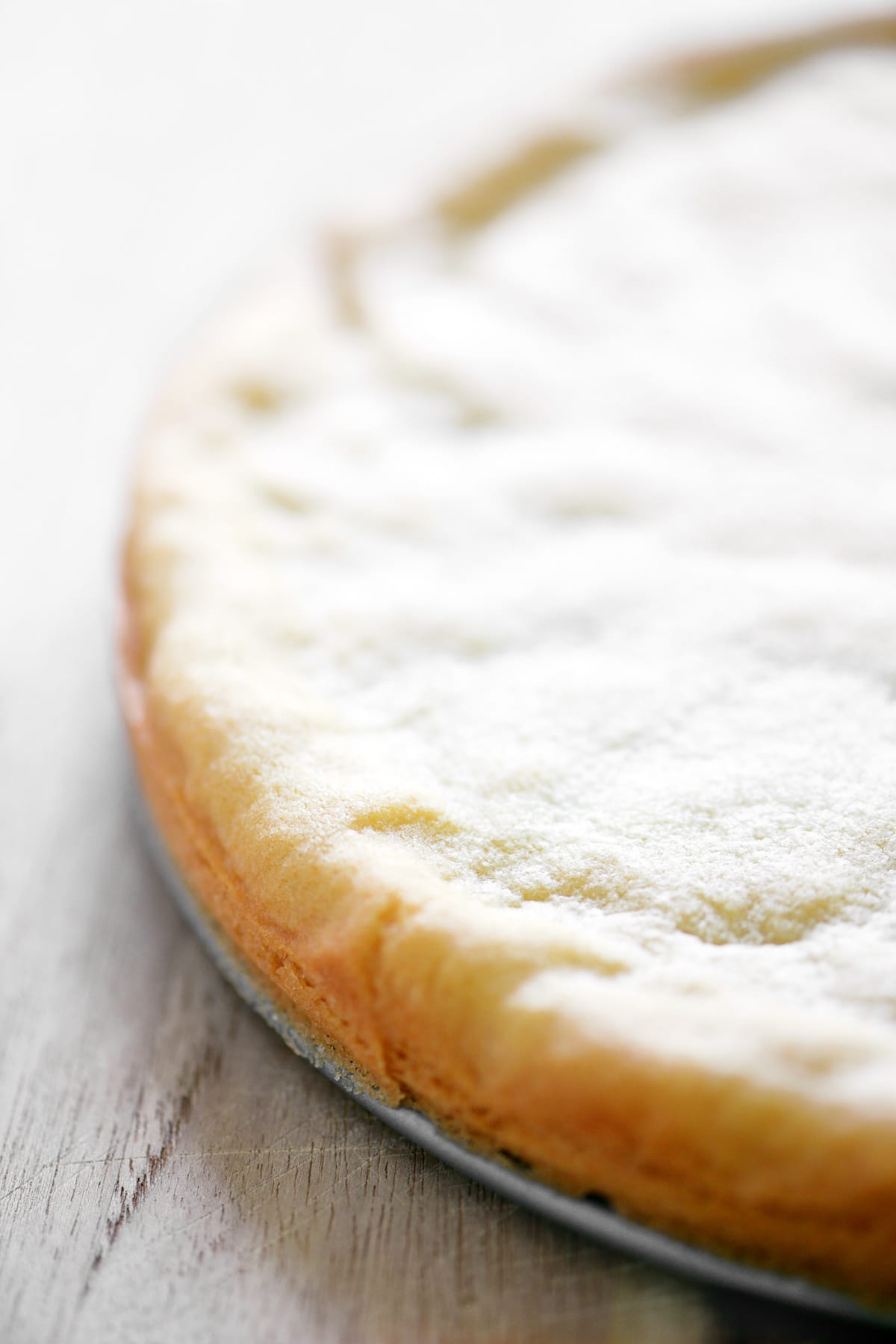 A sugar cookie crust on a pan.