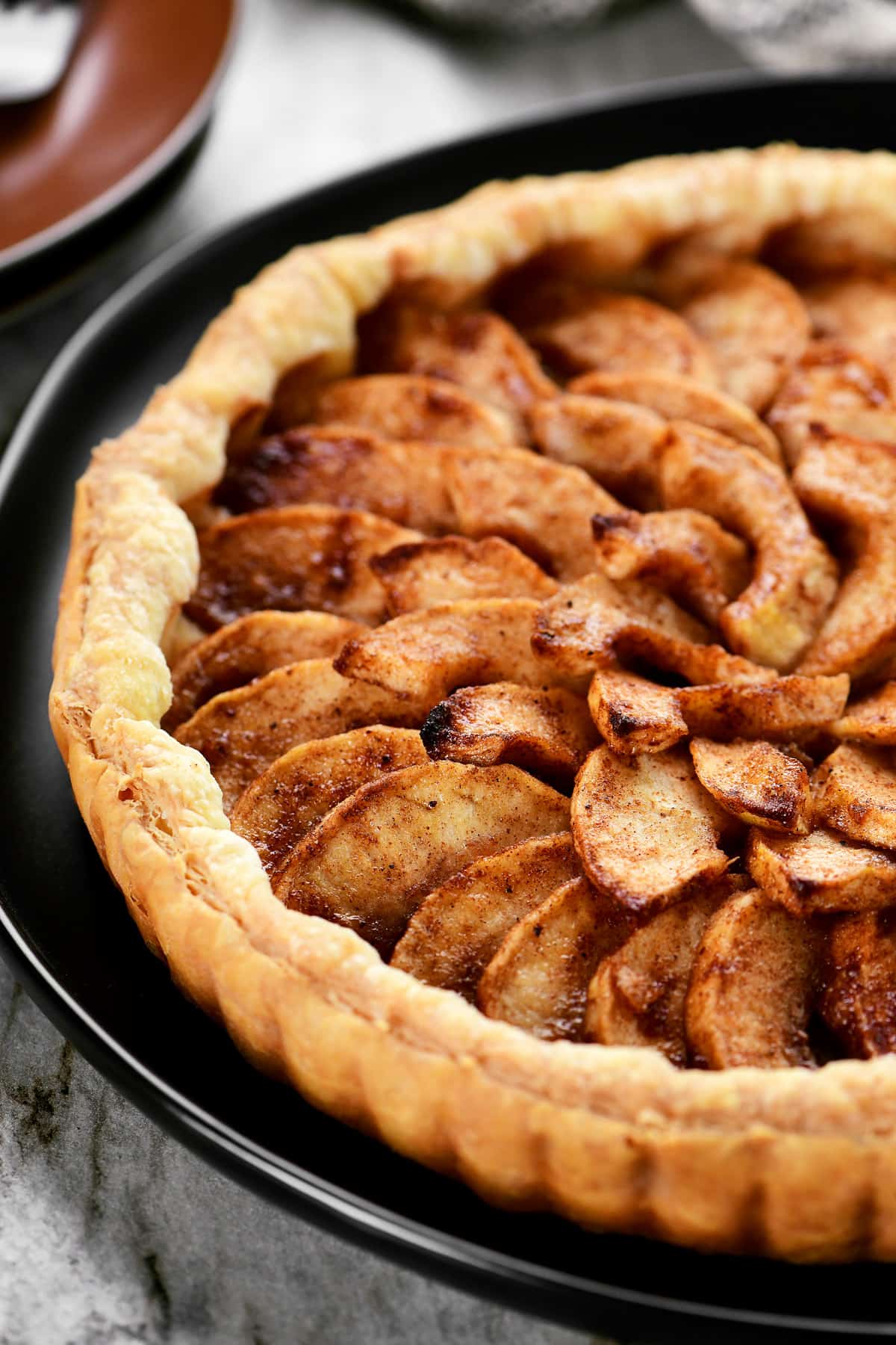 Apple tart on puff pastry.