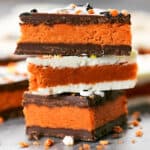 A stack candy corn truffle bark with butterfinger filling.