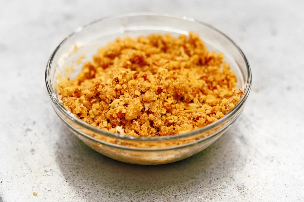 Crumb topping for sweet potato casserole in a glass bowl.
