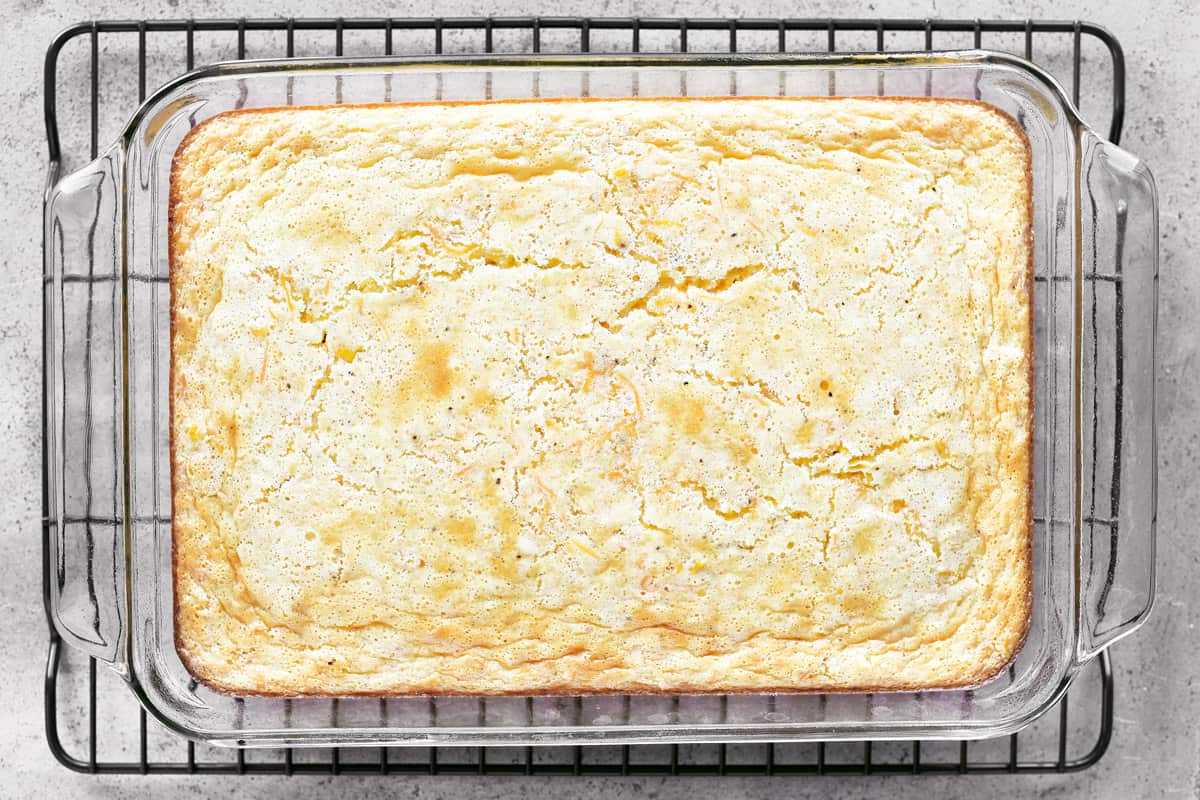 Corn casserole cooling on a wire rack