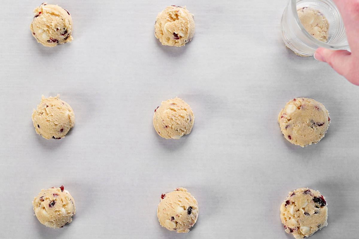 Flatten the cookie dough balls.