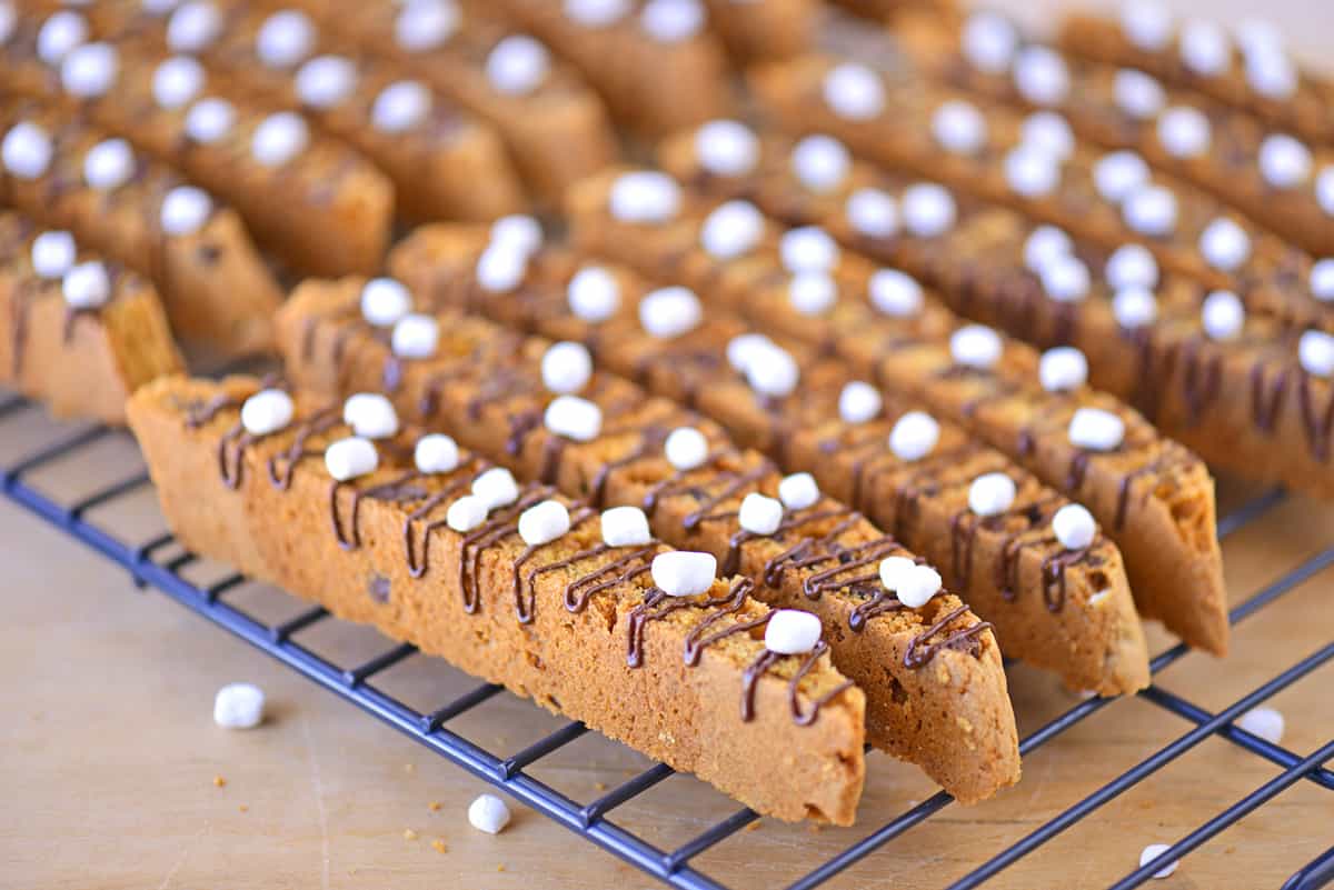 Chocolate chip biscotti cooling on a wire rack.