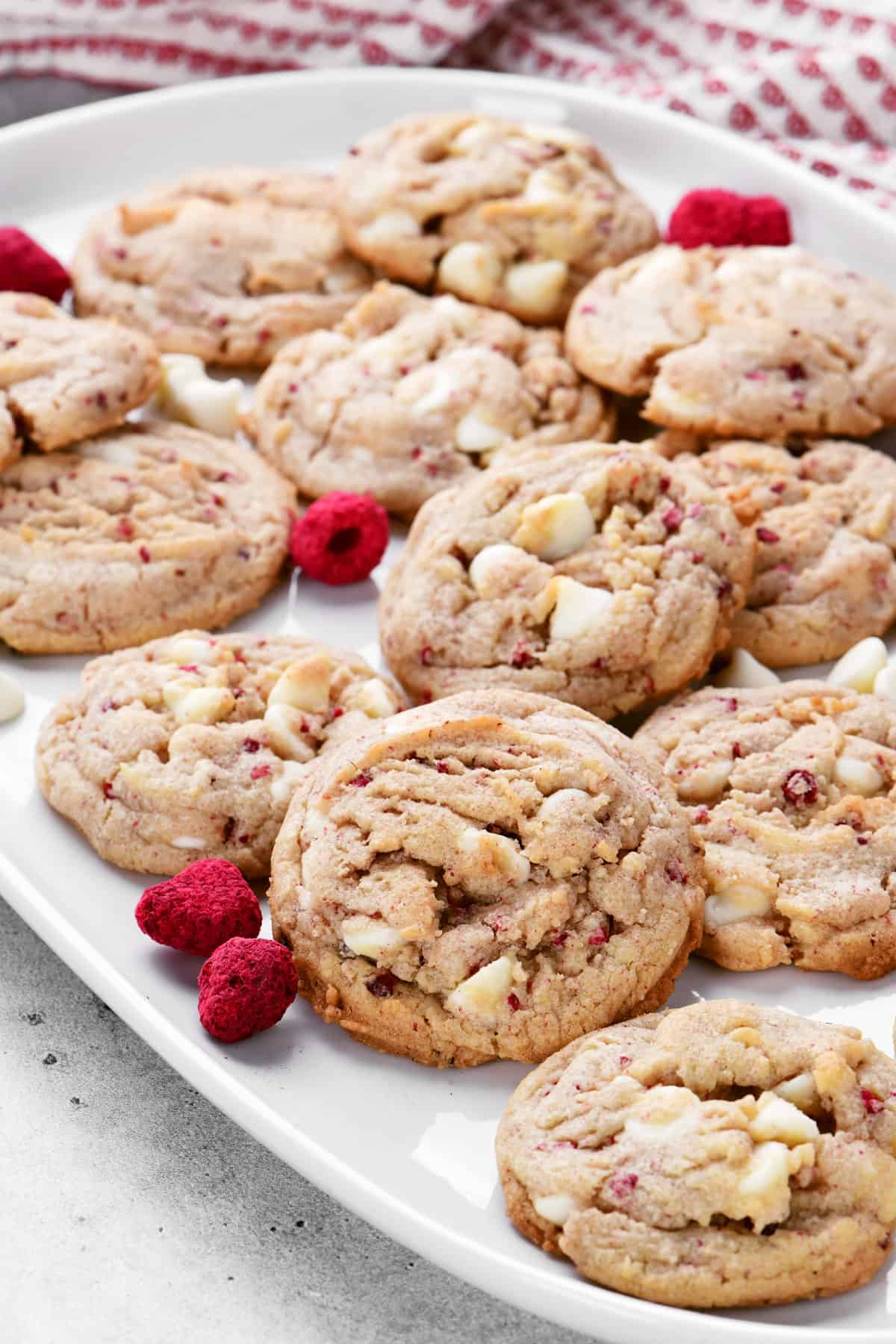 White chocolate raspberry cookies on a platter.