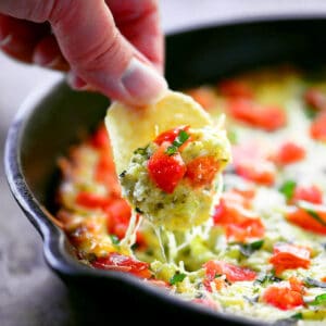 Cheesy caprese dip on a chip.
