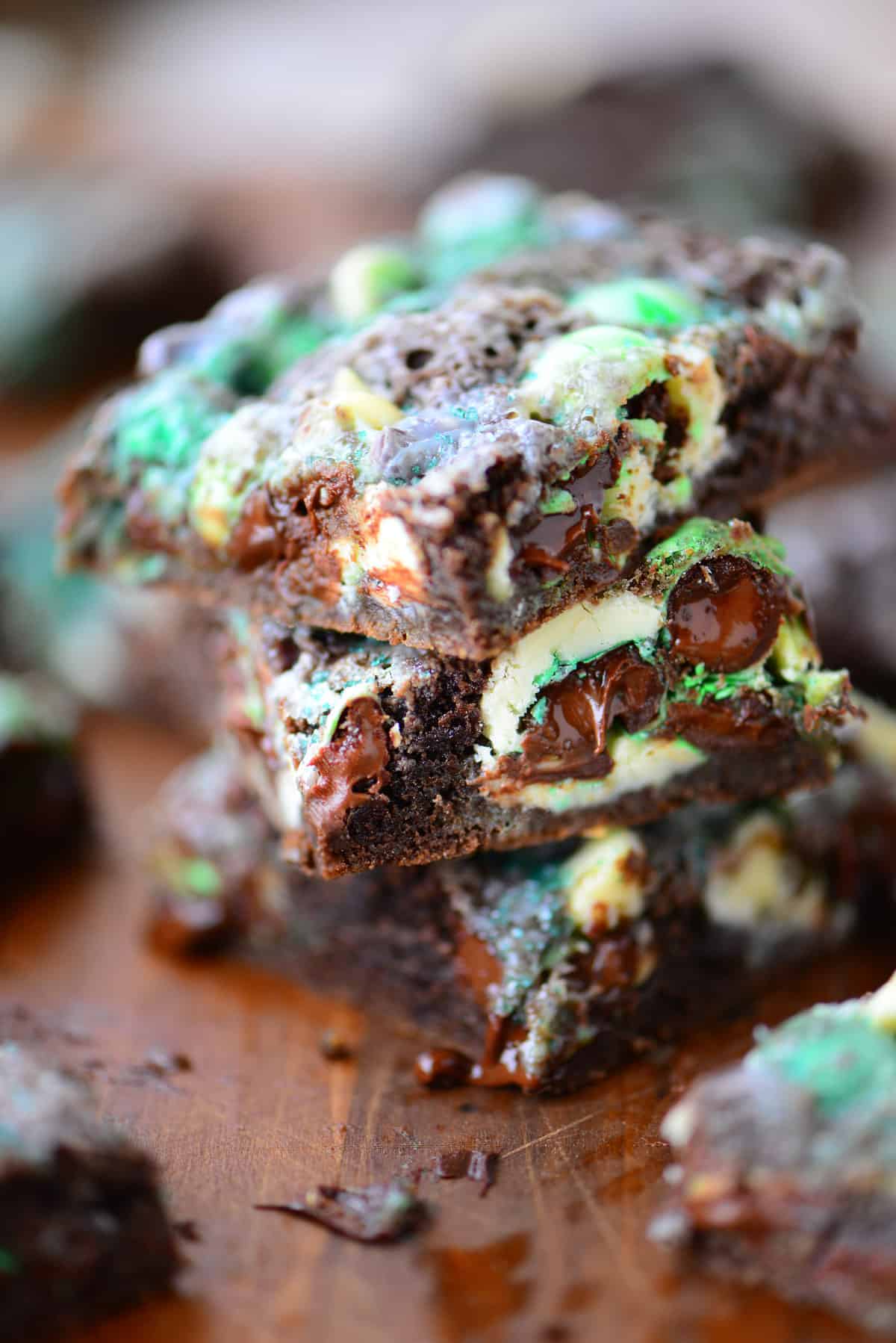 Stack of chocolate mint M and M cookie bars.