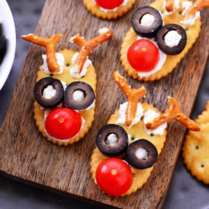 Reindeer crackers on a cutting board.