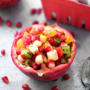 Pomegranate fruit salsa in a pomegranate bowl.