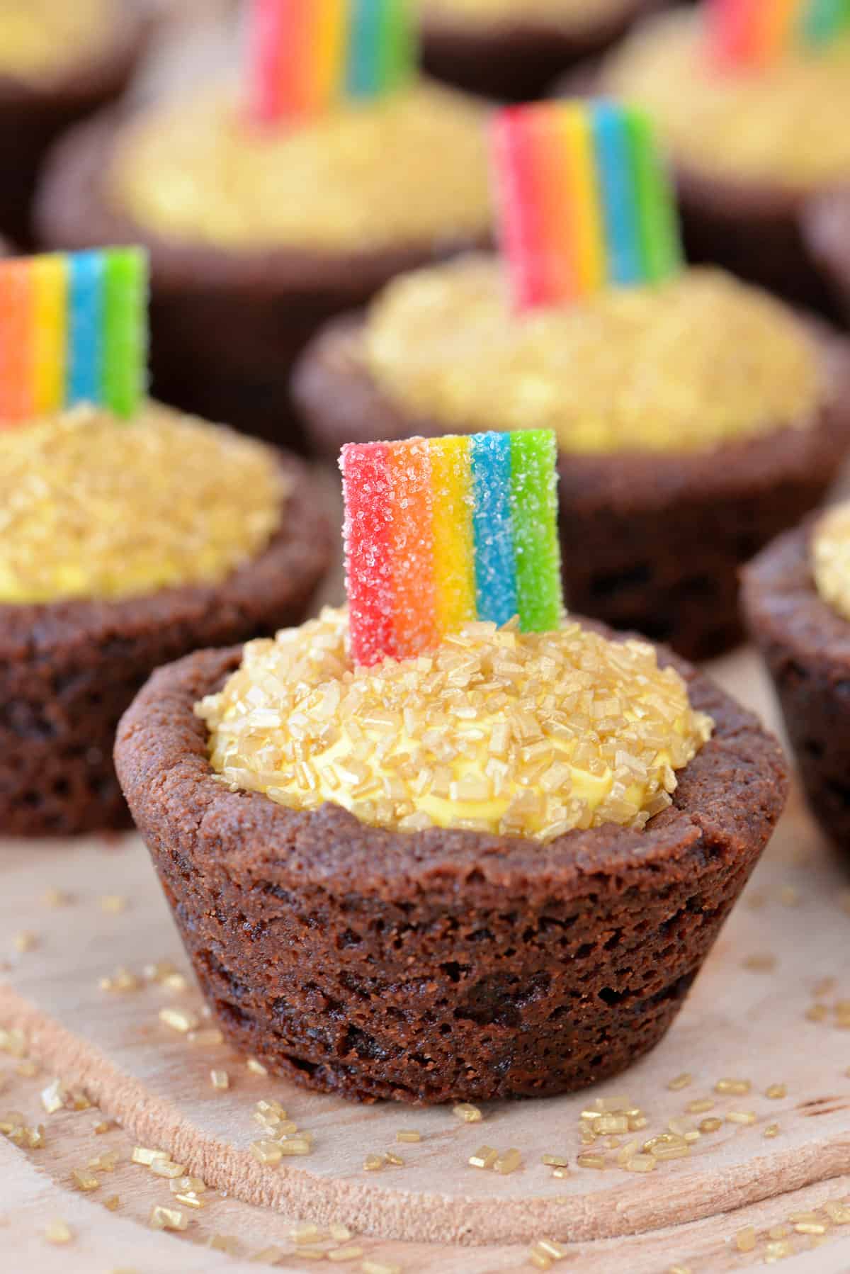 Pot of gold cookie cups with rainbows.