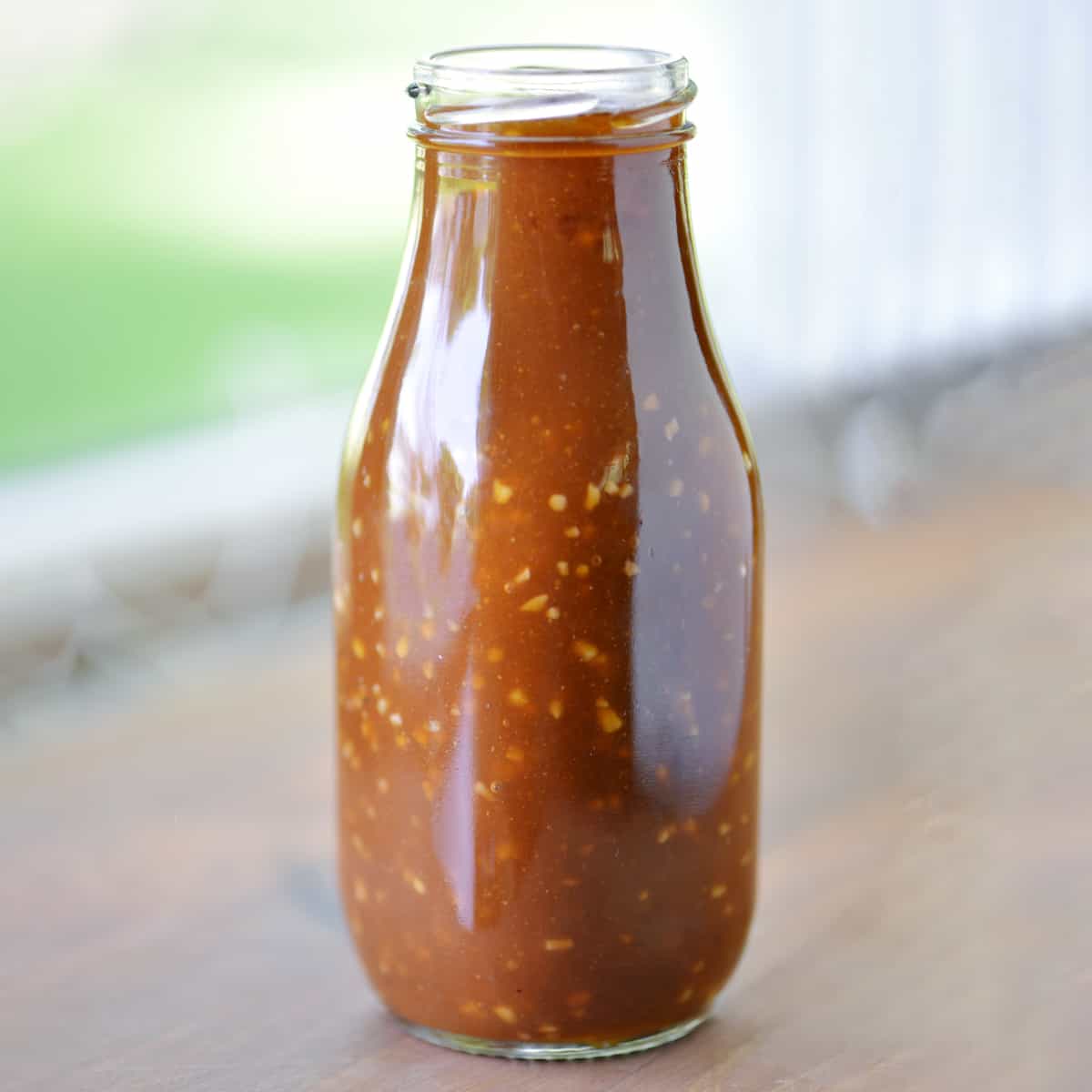 Homemade stir fry sauce in a glass jar.
