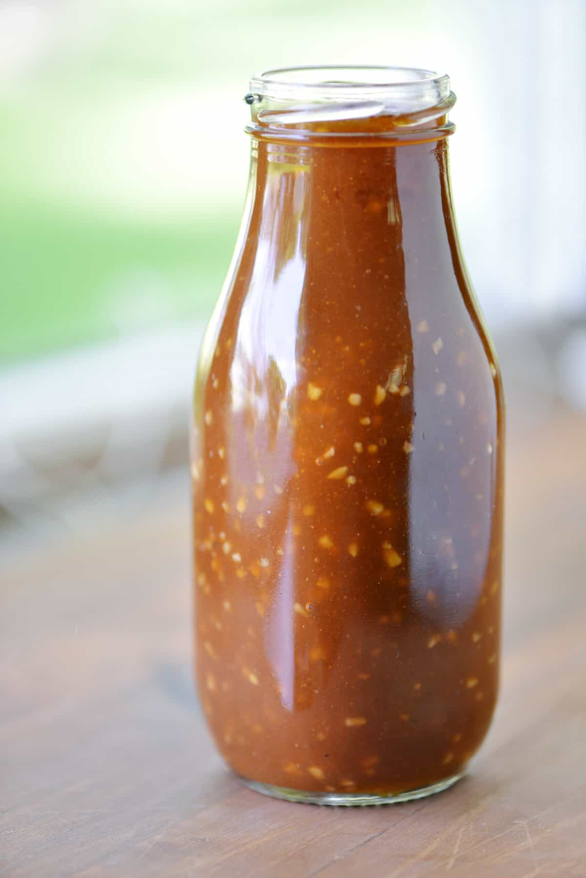 Homemade stir fry sauce in a glass jar.