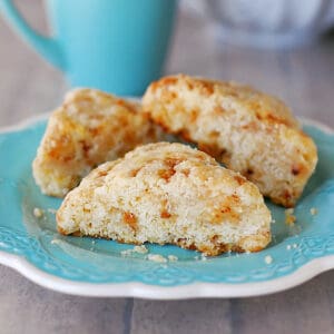 Toffee scones on an aqua plate.