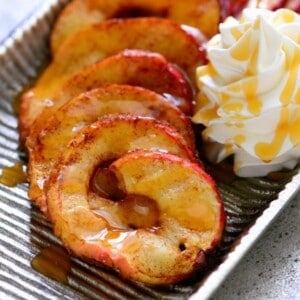 Baked apple tornado with whipped cream.