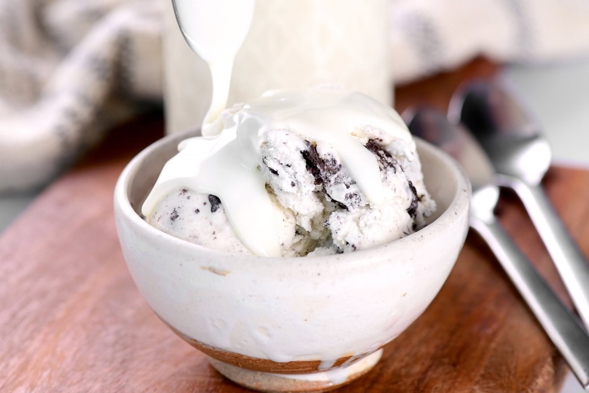 Drizzle white chocolate shell on ice cream.