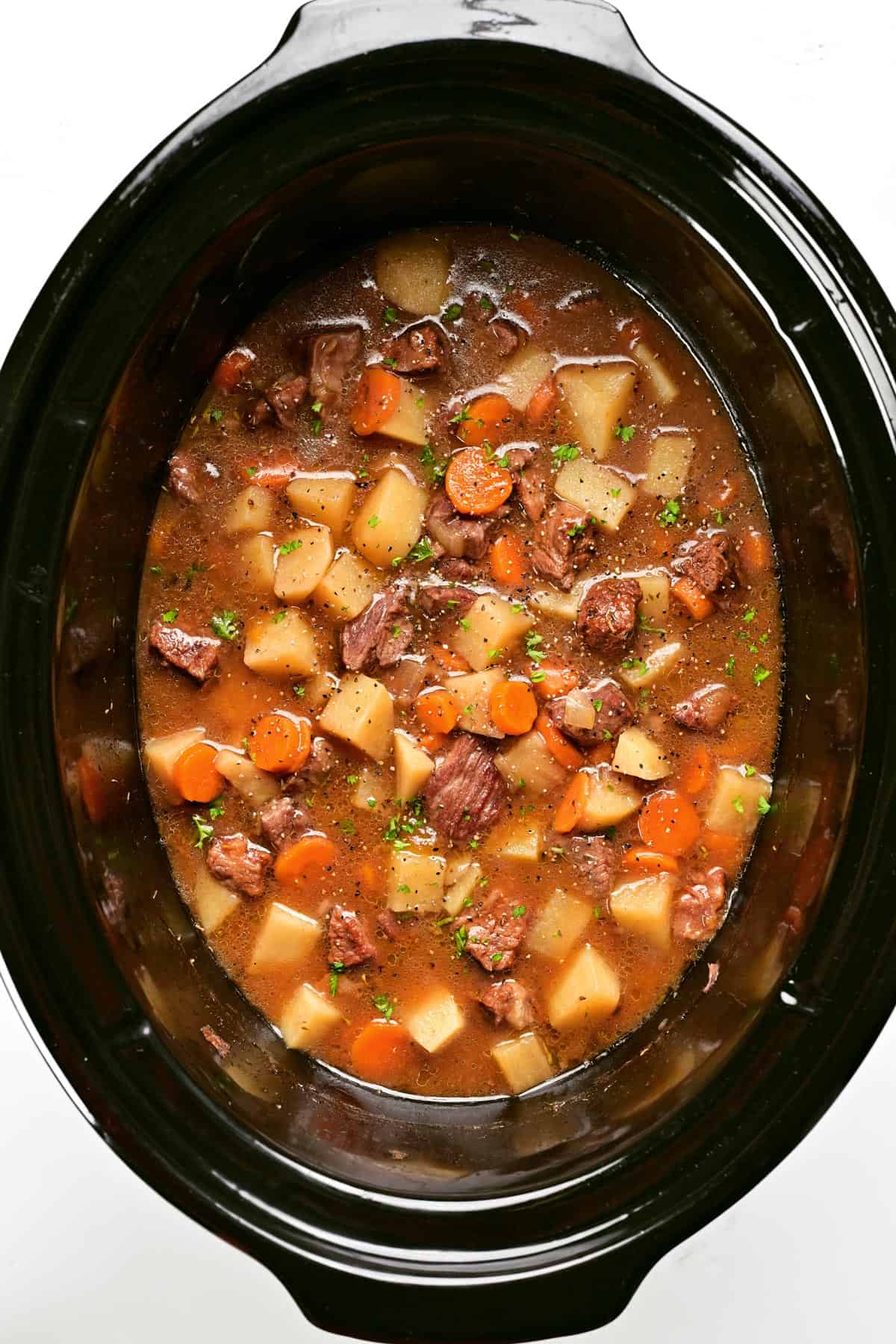 Beef stew in a slow cooker.