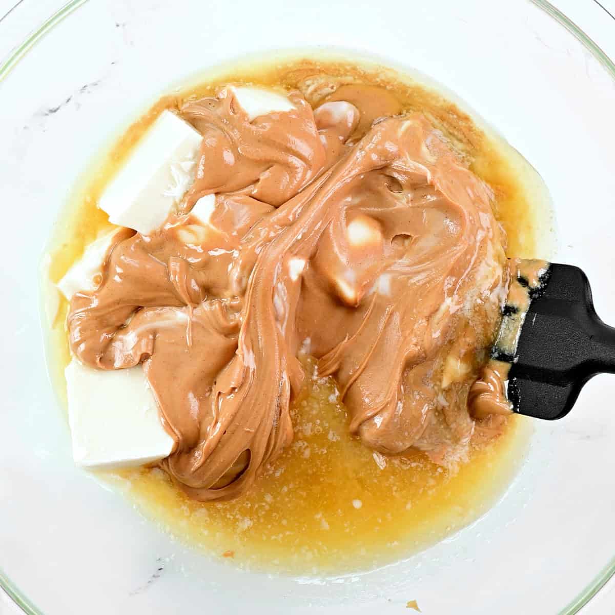 Melted peanut butter, almond bark, and butter.