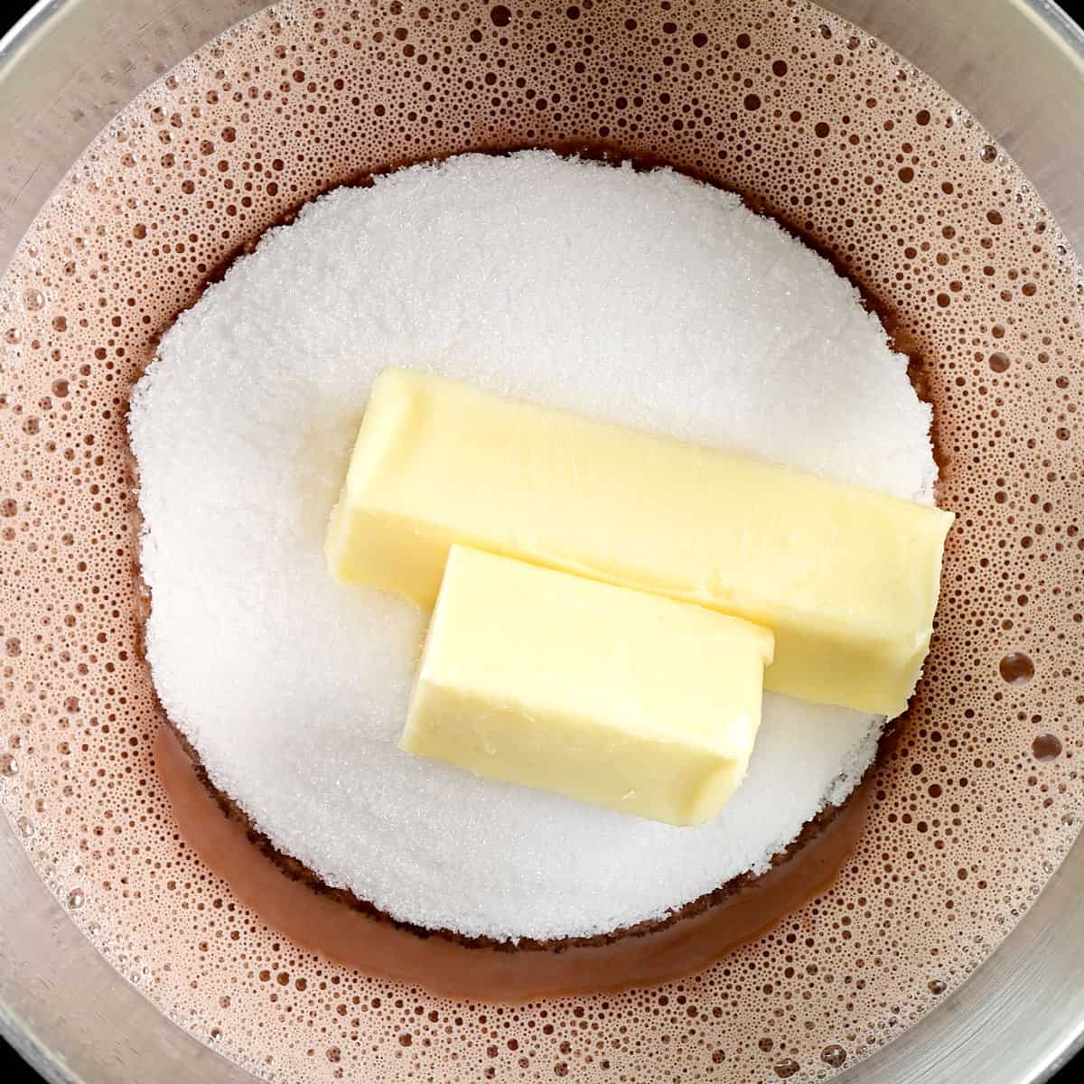 Stir in the sugar and the butter.