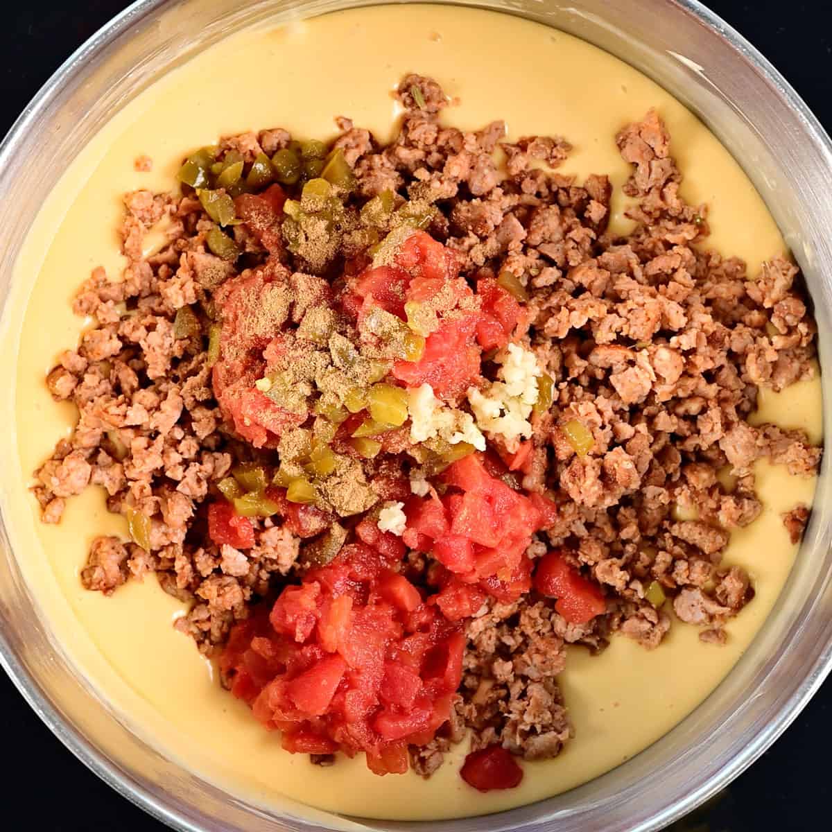 Ingredients in a large stainless steel pot.