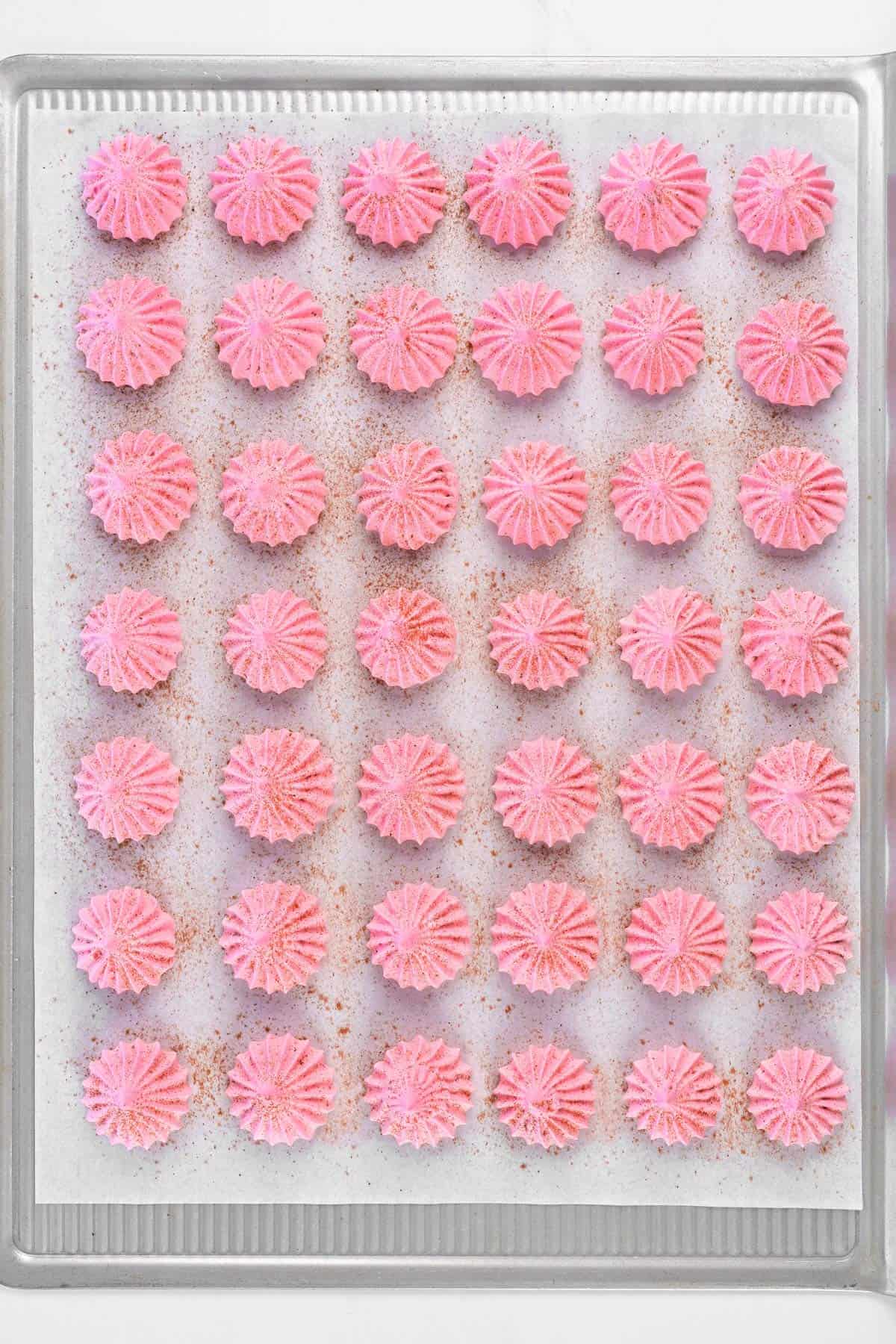 Baked strawberry meringue cookies.