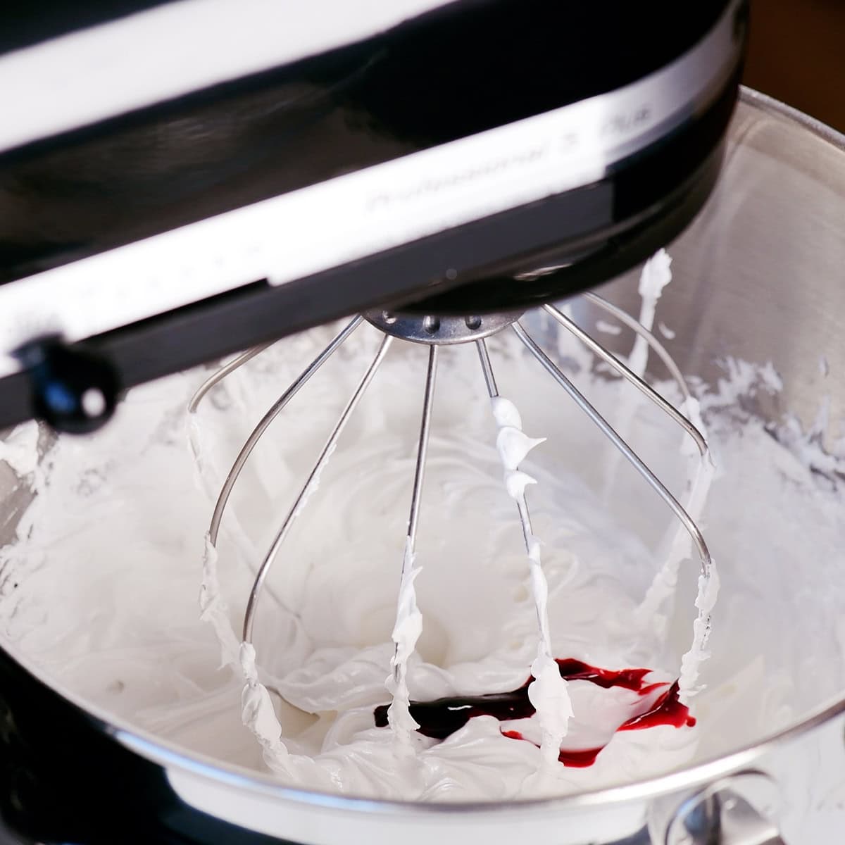 Add food coloring and vanilla extract.