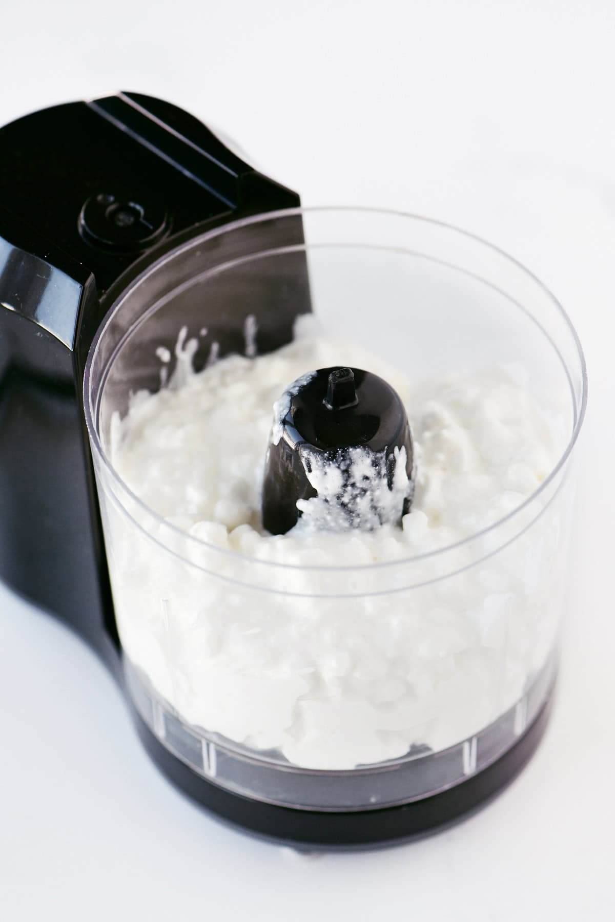 Cottage cheese in a mini food processor.
