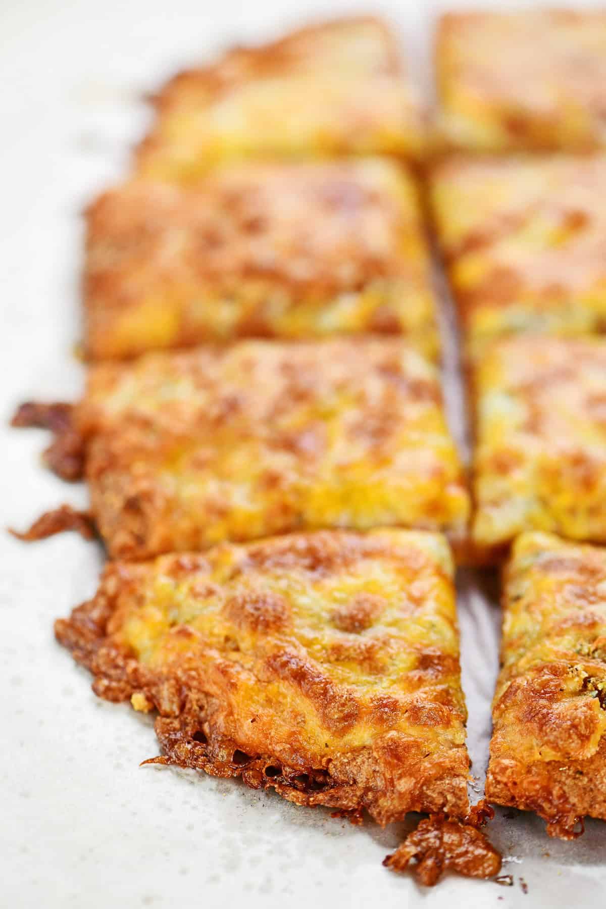 Cottage cheese cheesy garlic bread with crispy edges.