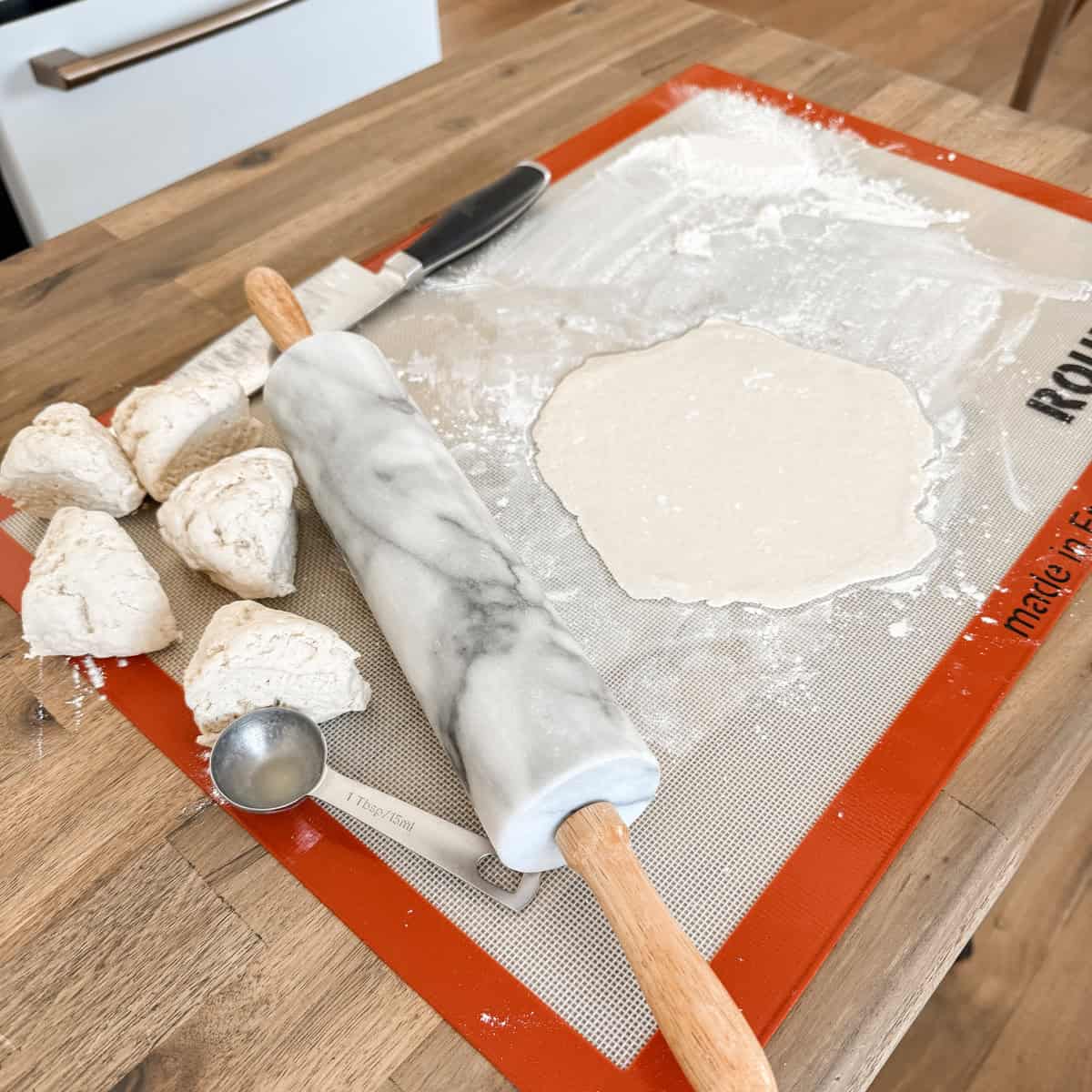 Working with cottage cheese dough.