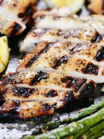Lemon pepper chicken marinade grilled chicken sliced and plated.