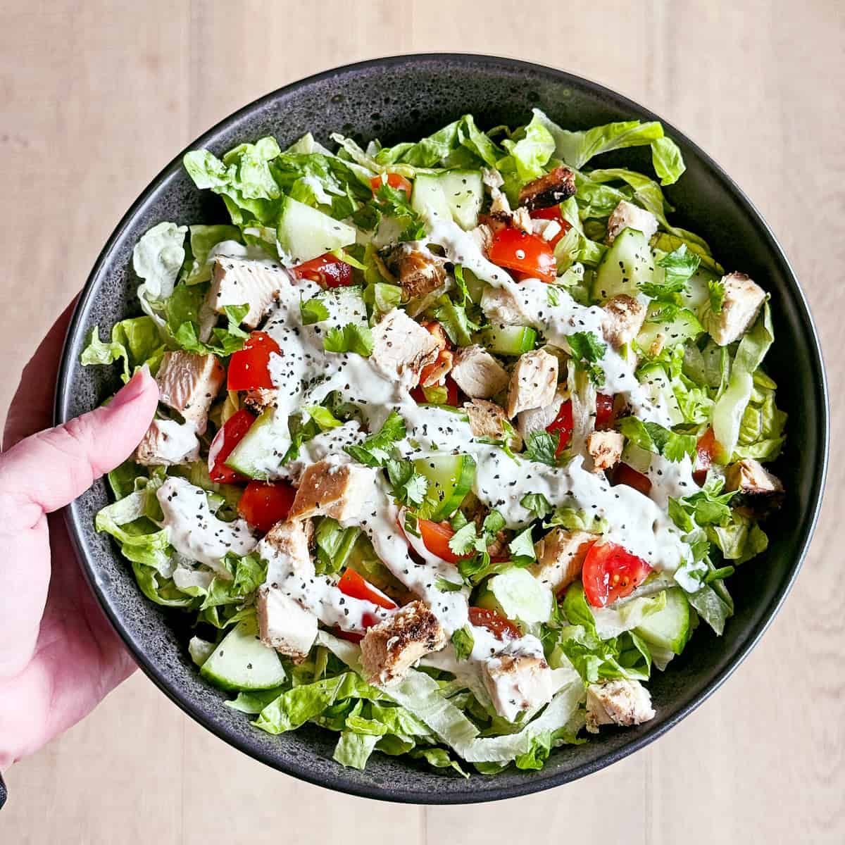 Salad with Greek chicken marinade grilled chicken.